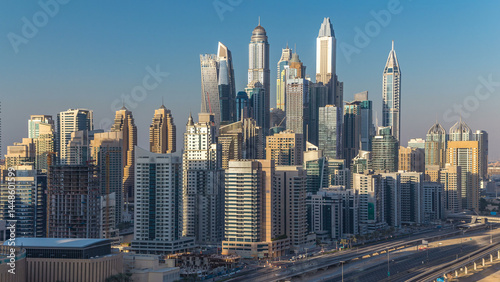 Dubai Marina towers during sunset aerial timelapse, United Arab Emirates