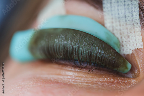 Obraz na płótnie Eyelash lamination close-up on a woman's face. Women's beauty procedures. w salonie