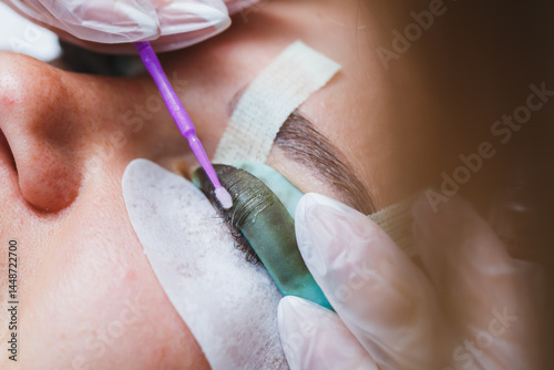 Obraz na płótnie Eyelash lamination close-up on a woman's face. Women's beauty procedures. w salonie