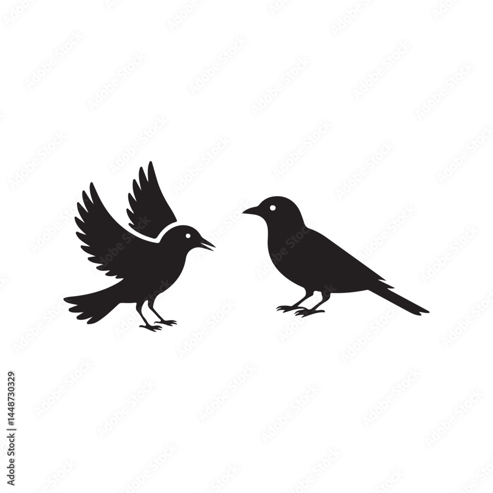 Fototapeta premium Silhouette of Two Birds Facing Each Other.Simple black silhouette of two birds, one with outstretched wings, facing each other.