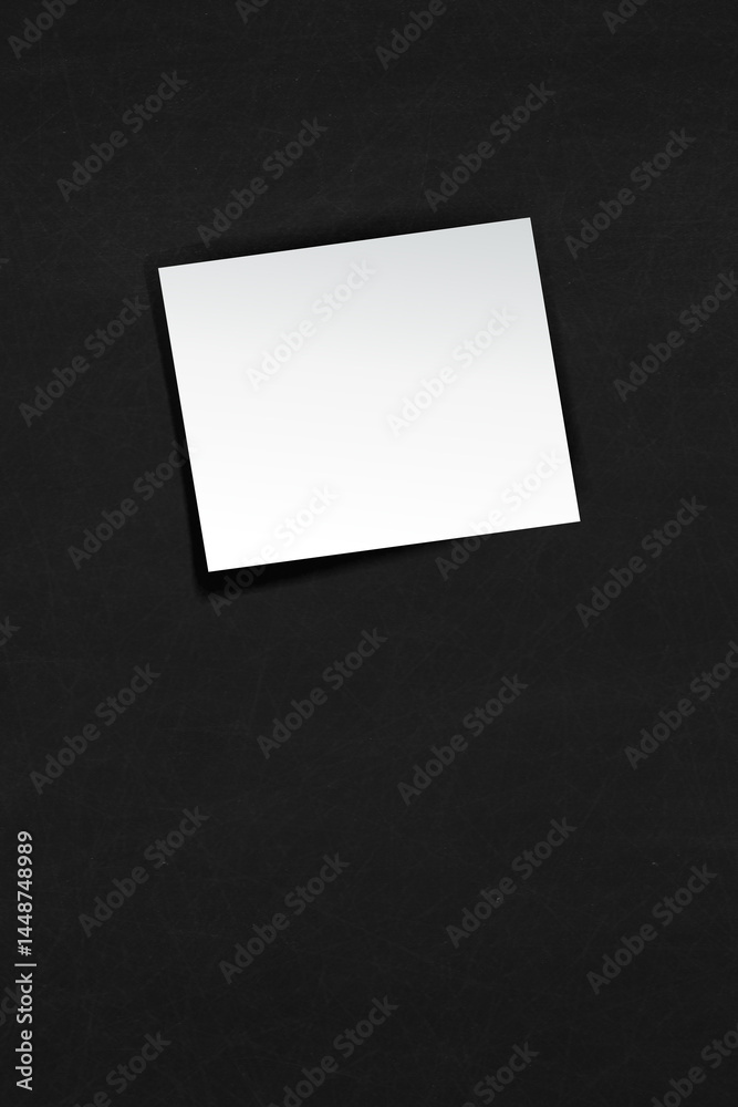 Empty white adhesive note placed on a chalkboard surface. Empty white adhesive note placed on a chalkboard surface.
