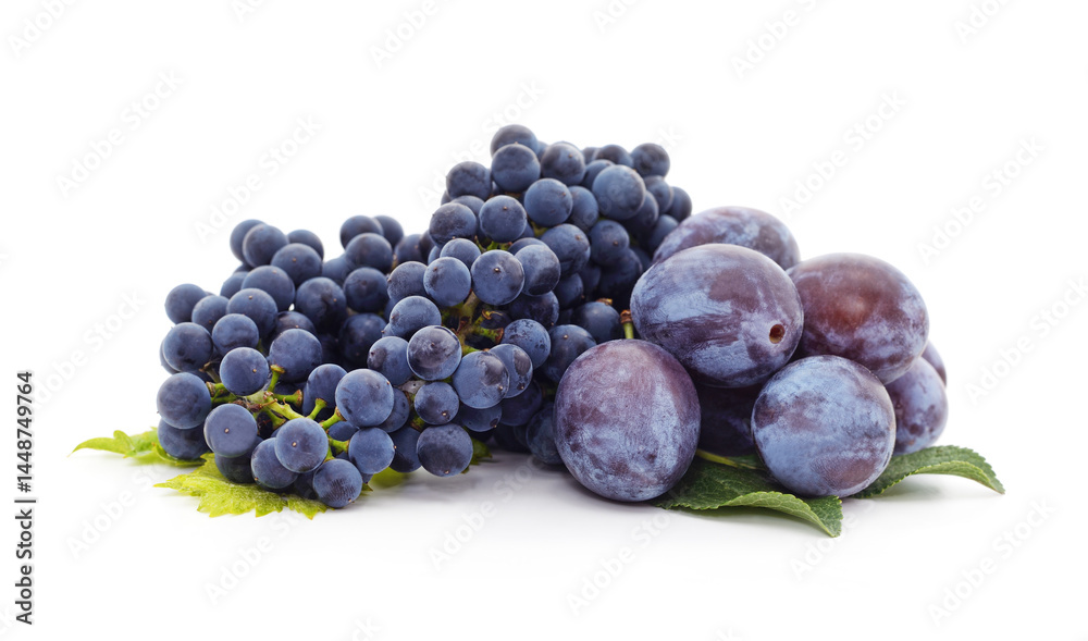 Fototapeta premium Group of ripe plums with grapes.