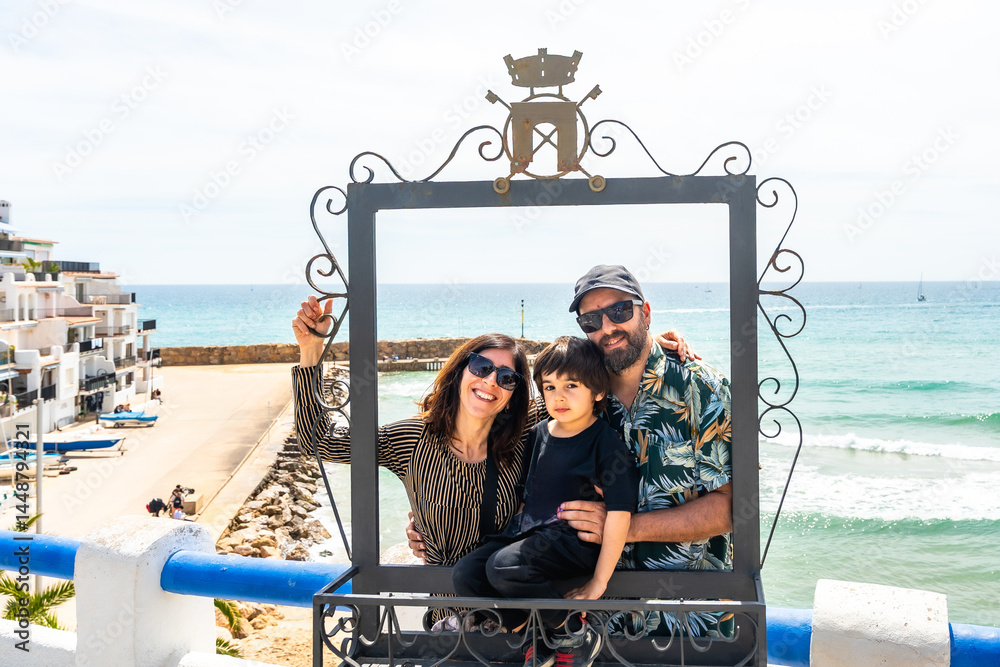 Family enjoying the view of roc de sant gaieta in comarruga, tarragona
