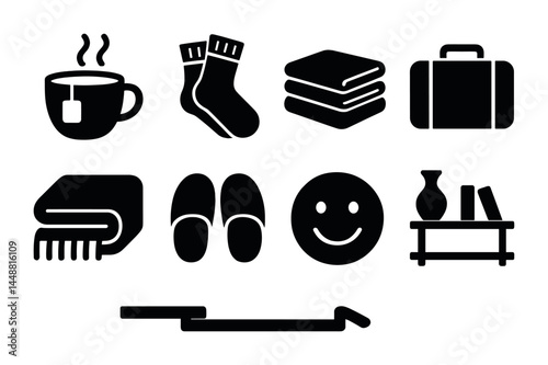 Cozy comfort solid icons set – silhouette style for home relaxation and lifestyle: tea cup, socks, pillows, suitcase, blanket, slippers, smiley face, bookshelf