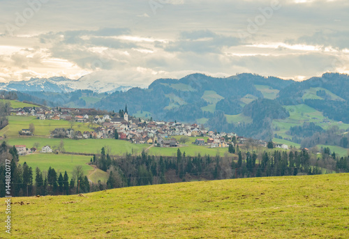 Mogelsberg, Switzerland - December 23rd 2023: View towards the beautiful historic village between hills