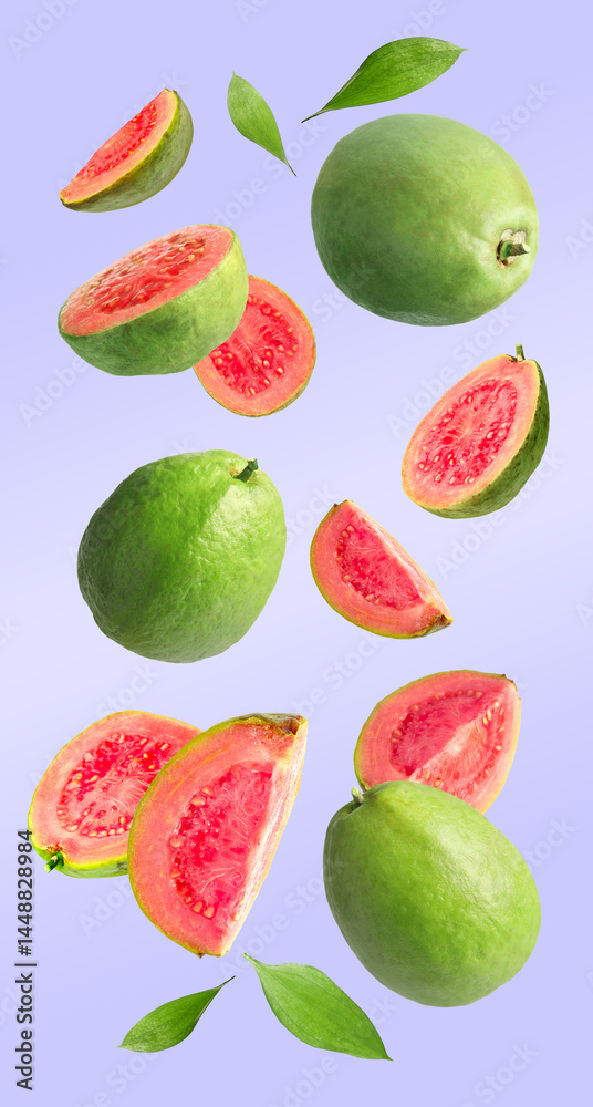 Fresh guava fruits and leaves falling on light violet background Fresh guava fruits and leaves falling on light violet background
