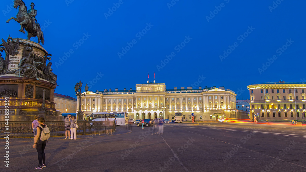 Fototapeta premium Mariinsky palace and monument to Nikolay I from Isaac's square day to night timelapse hyperlapse. Saint-Petersburg, Russia
