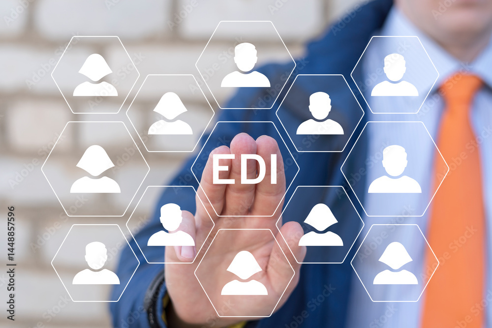 Concept of Electronic Data Interchange (EDI) Technology. Business person using virtual touch screen push button with text: EDI.