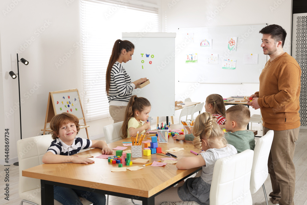 Obraz premium Children and teachers during lesson in school