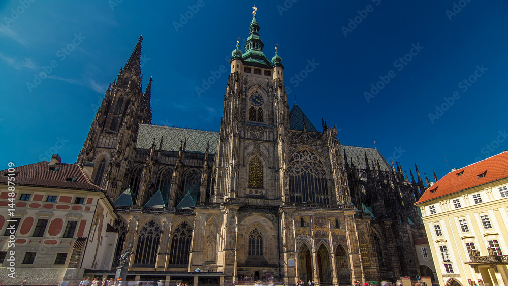 Fototapeta premium St. Vitus Cathedral timelapse hyperlapse in Prague surrounded by tourists.