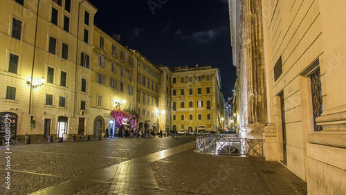 Fototapeta Naklejka Na Ścianę i Meble -  Walk down streets of Rome timelapse hyperlapse from the Pantheon to fountain Trevi showing restaurants and the blur of people at night