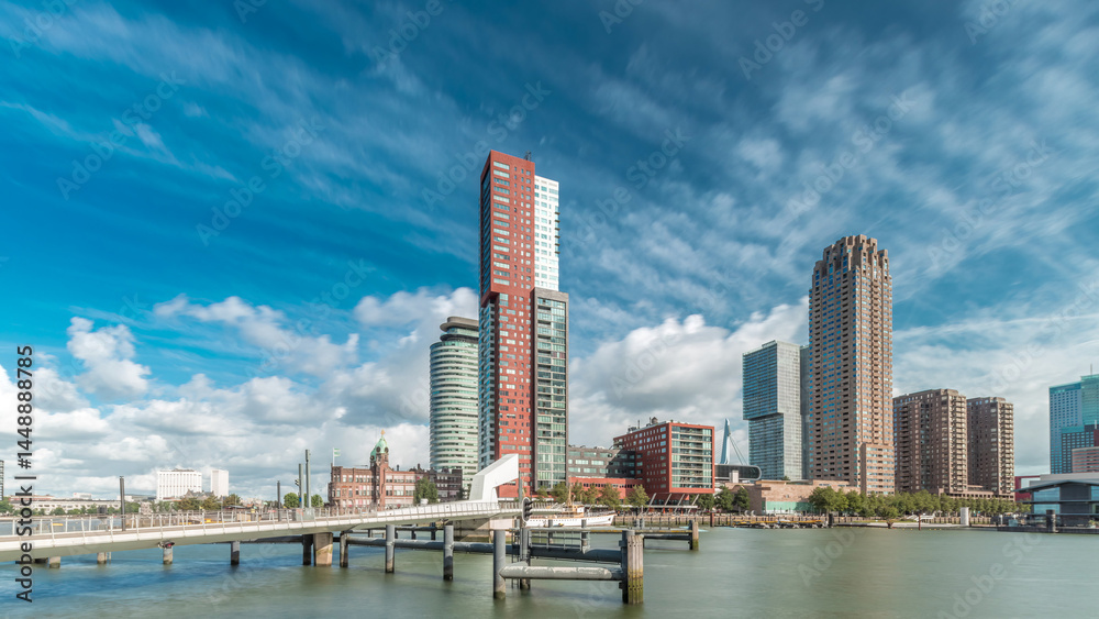 Naklejka premium Hyperlapse of the Rijnhaven Bridge with skyscrapers in Rotterdam, Netherlands.