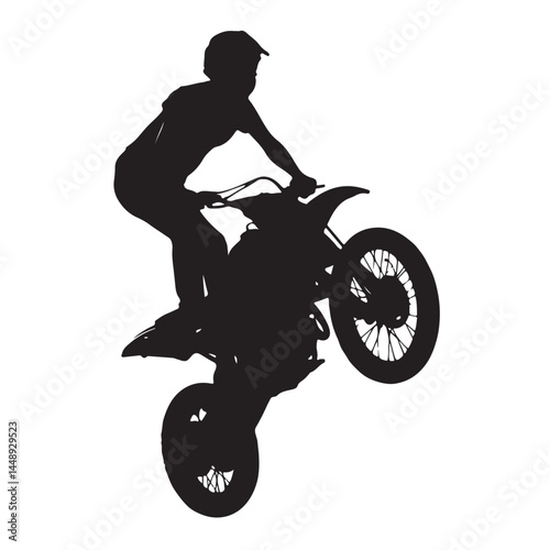 Silhouette motocross motorbike rider doing wheelie stunt extreme sport action black and white photography
