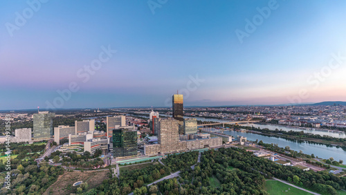 Photography Aerial panoramic view over Vienna city with skyscrapers, historic buildings and a riverside promenade day to night timelapse in Austria