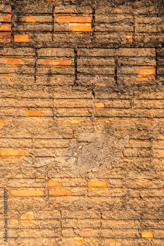 Rustic brick wall texture with weathered mortar. Ideal for construction, architecture, urbanism, and restoration themes