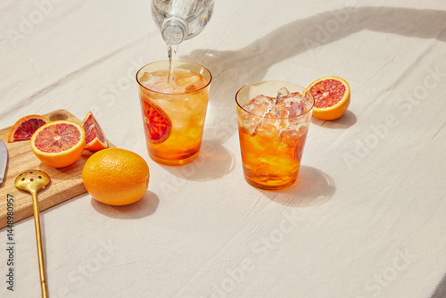 Pouring Club Soda Into Drink photo