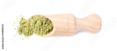 Superfood product. Pumpkin seeds powder in scoop isolated on white, top view
