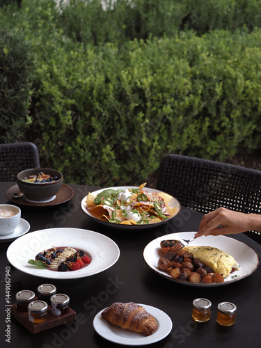 Canvas Print Outdoor Brunch Table with Salad and Assorted Dishes