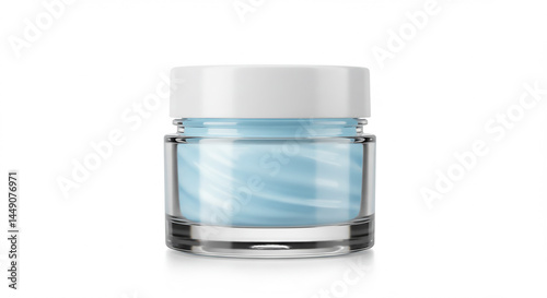 Close up of a clear jar with a white lid containing a light blue cream on a white background photo