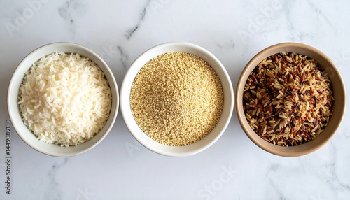 Three bowls showing portion sizes of rice, quinoa, and brown rice for a comparison visual.
