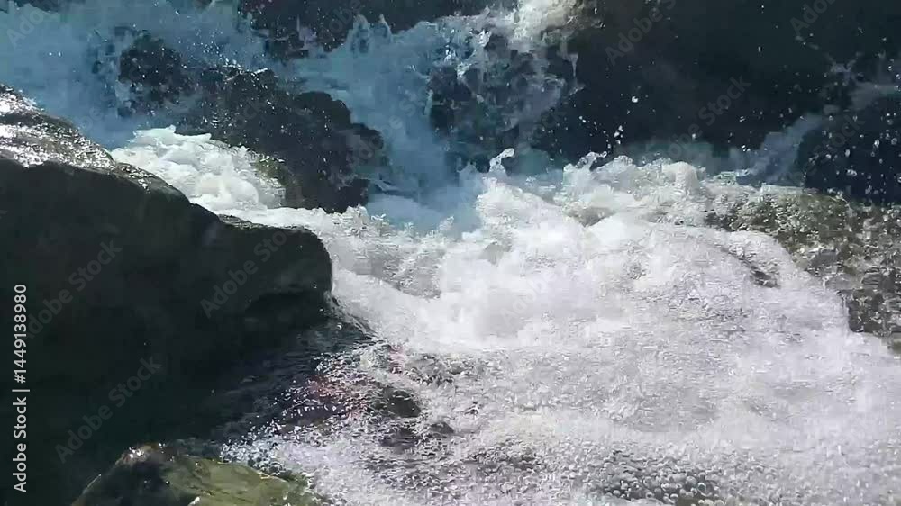 Serene Mountain Stream: Sparkling Water Cascades Over Rocks Serene Mountain Stream: Sparkling Water Cascades Over Rocks