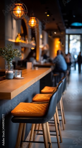 Interior of a modern cafe  bar counter with stools  and customers.  Possible use in advertising for cafe design  restaurant scenes