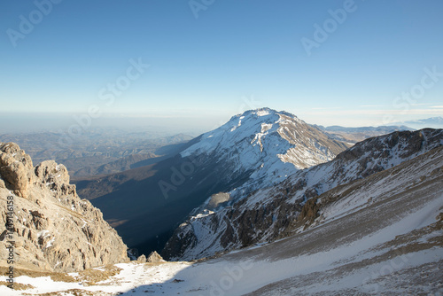 Snow-Covered Mountain Peak at Sunrise
