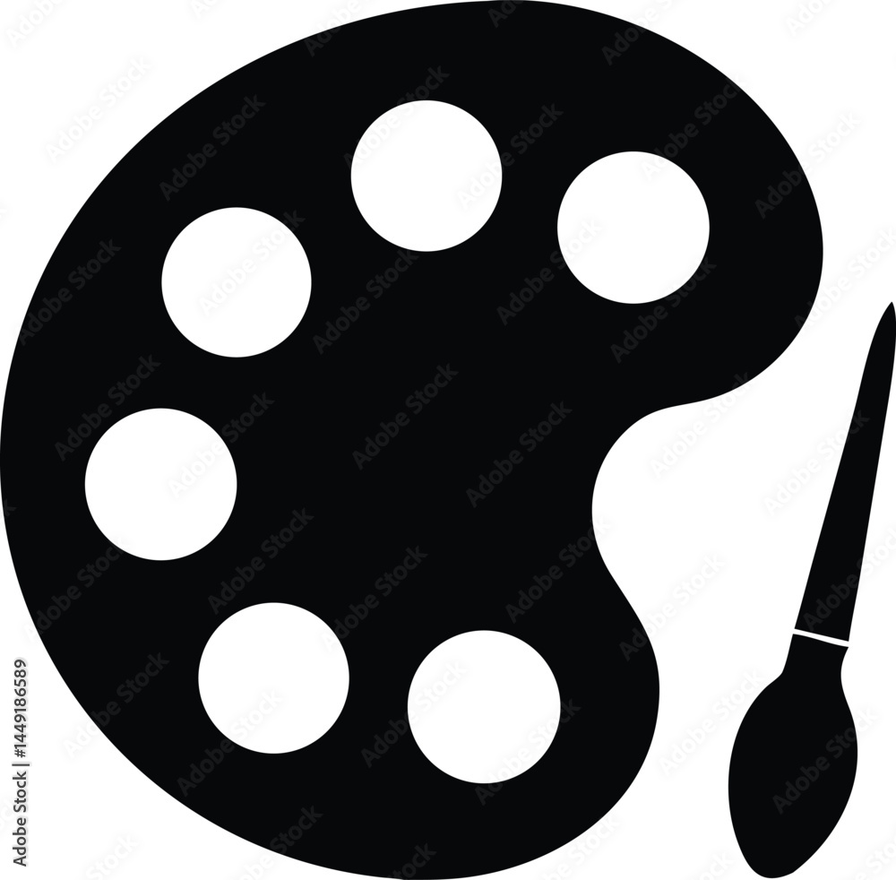 Fototapeta premium A black artist palette beside a paintbrush shows creativity and artistic inspiration