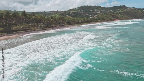 Rase-motte sur les vagues de l'Anse Charpentier, Martinique.