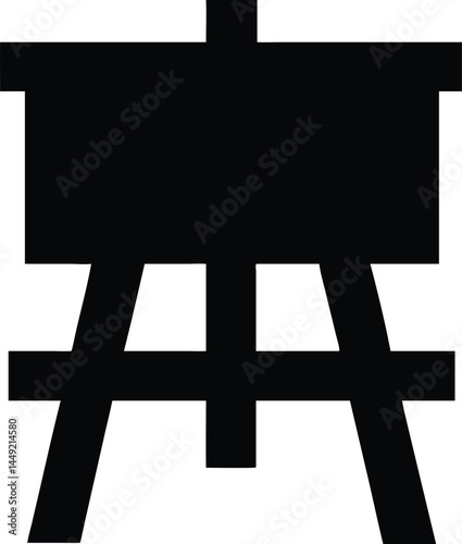 Simple black artist's easel displays a blank canvas on a bright, plain background