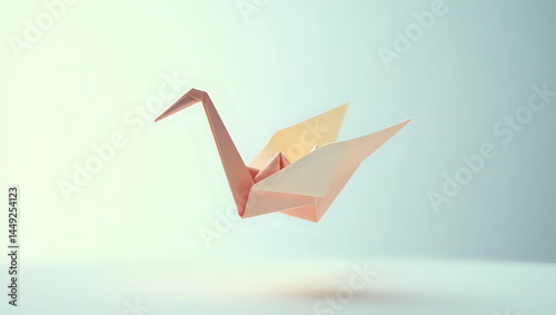 A delicate origami crane gracefully suspended in mid-air, showcasing intricate folds against a soft, blurred background
