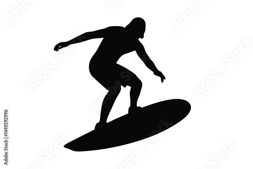 Silhouette of a person surfing on a wave