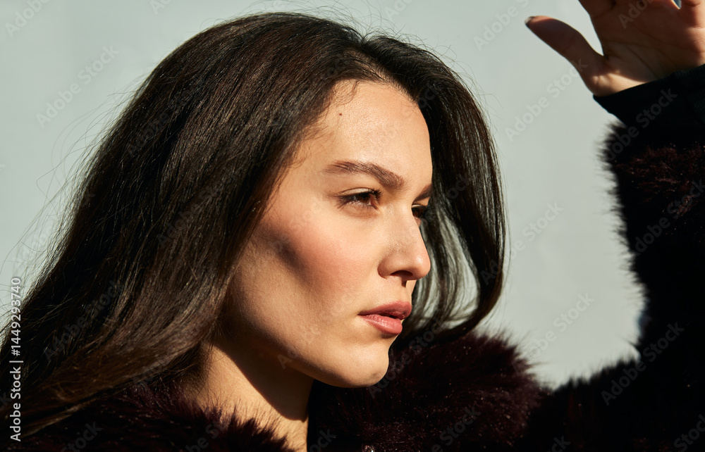 Attractive brunette looking to the side Attractive brunette looking to the side