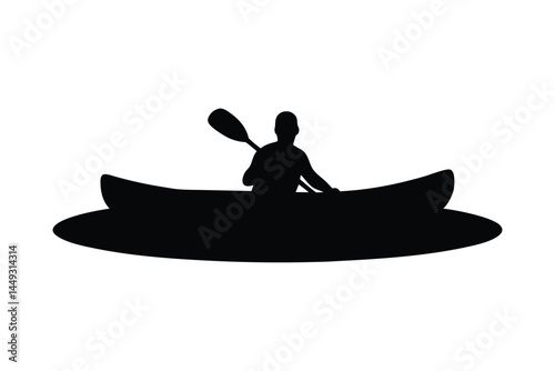 Silhouette of a person kayaking on a river or lake
