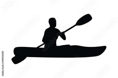 Silhouette of a person kayaking on a river or lake