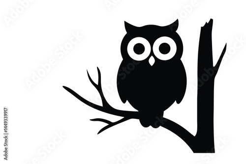 Silhouette of an owl perched on a tree branch