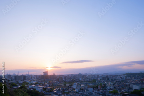 大分市の夜明けと朝焼けの空