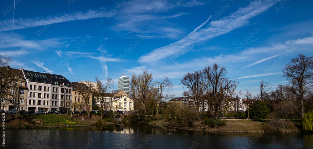 View to a lake and trees in the city