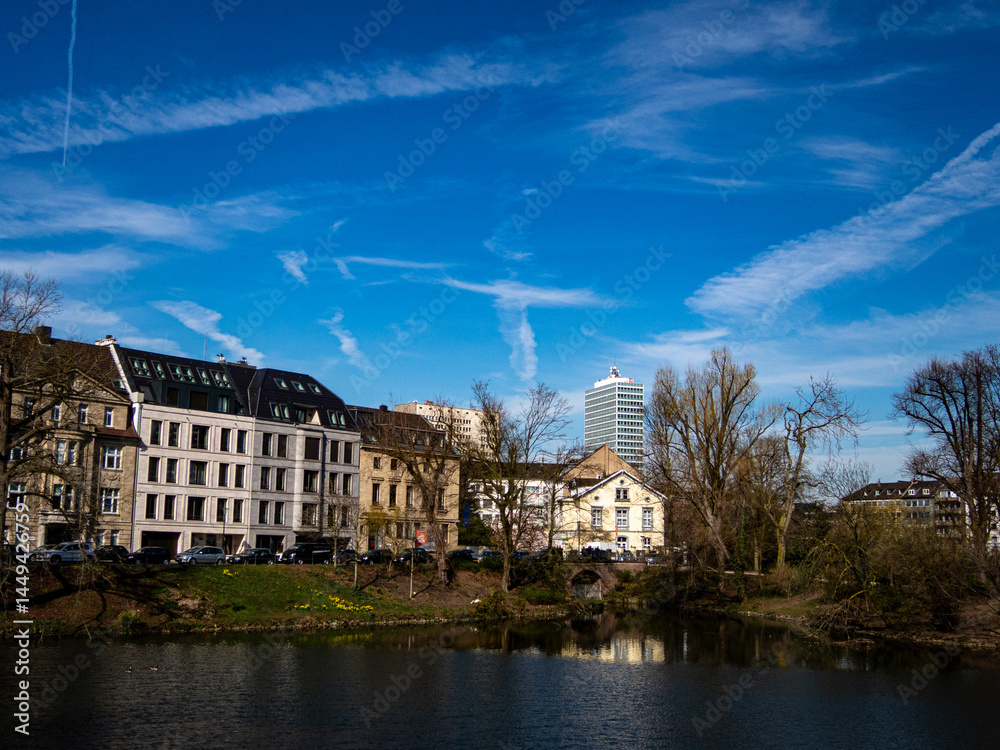 View to a lake and trees in the city