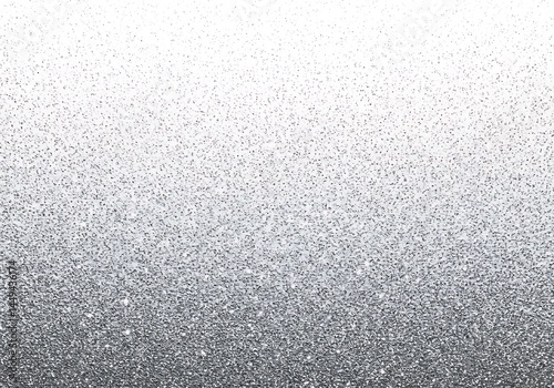 A sparkling silver glitter texture fading into white creating a gradient background design element