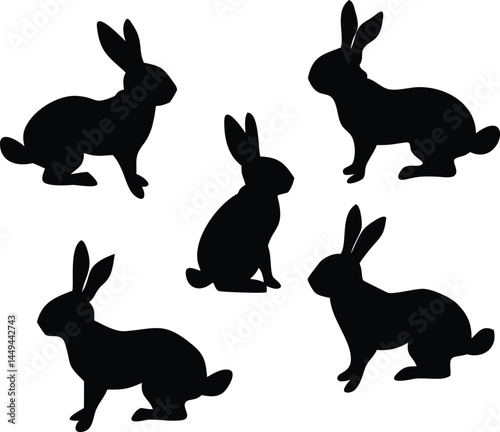 Silhouette rabbits hopping and sitting in varying postures show a clean transparent background ready for integration