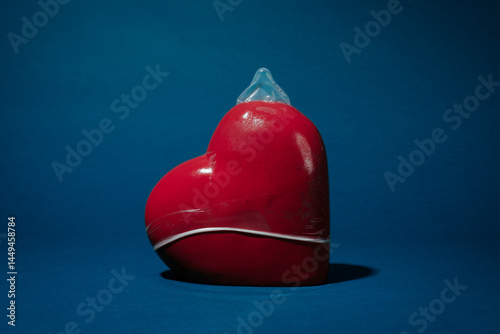 condom covering a porcelain heart
