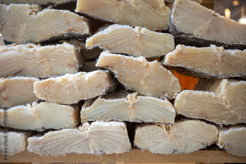 Traditional dried salted codfish stack photo