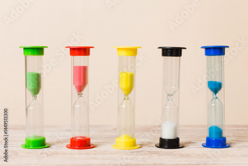 hourglass on the table, sand clock as time passing concept for business deadline, copy space