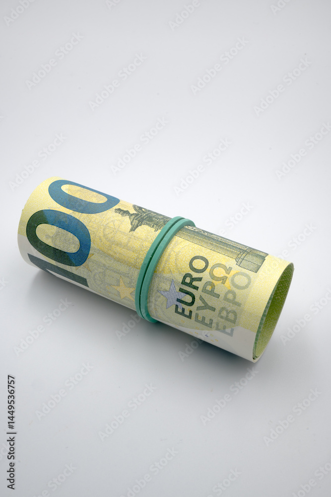 European currency, banknotes rolled into a roll.
