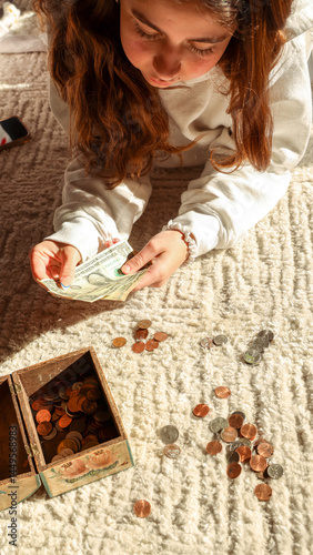 Teen Girl Counting Savings