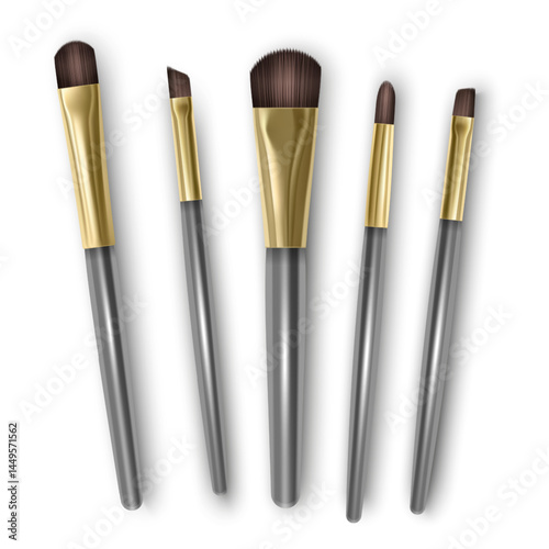 Set of realistic makeup brushes on white background.