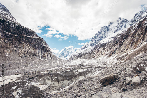 Discover the scenic viewpoint and panoramic views of the Montenvers Mer de Glace and Mont Blanc mountains, and the red train in Chamonix, Haute-Savoie, France.