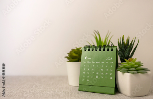 Hello, June. The planning calendar for June 2025 is on the desktop.