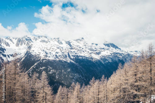 Discover the scenic viewpoint and panoramic views of the Montenvers Mer de Glace and Mont Blanc mountains, and the red train in Chamonix, Haute-Savoie, France.